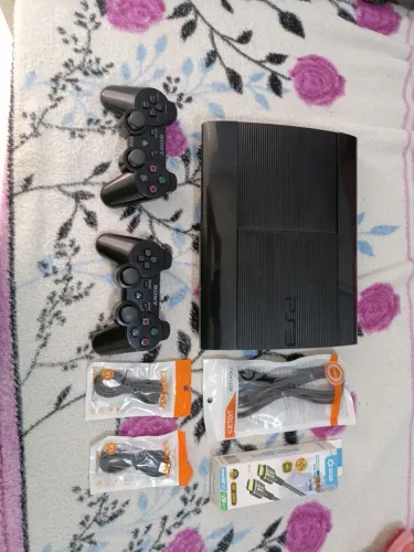 Ps3 super slim 1tera com 2 controles originais