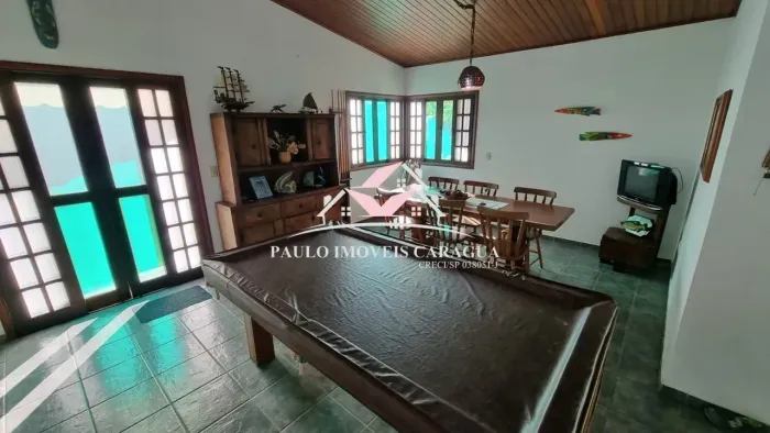 Casa de condomínio para venda possui 167 m² com 3 quartos na Praia do Massaguaçu - Caragua
