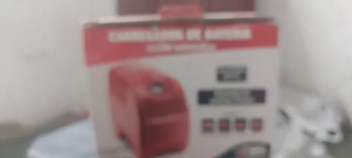 Carregador de bateria usado 1 vez APENAS 100 ,00 NA LOJA É MAIS DE 300