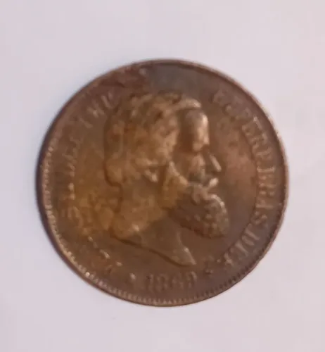 Moeda antiga 20 réis de 1869.