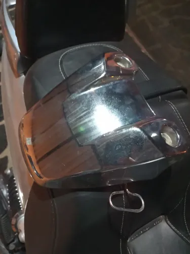 Boné suporte de farol Harley Davidson Sportster