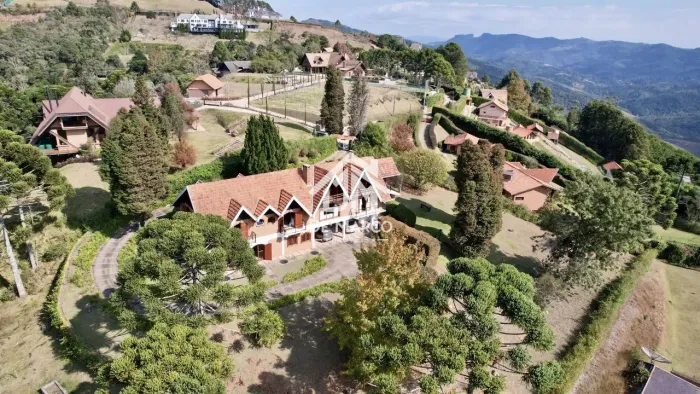 Casa com 5 dormitórios à venda, 472 m² por R$ 2.900.000,00 - Condomínio Morro Pedra do Fog