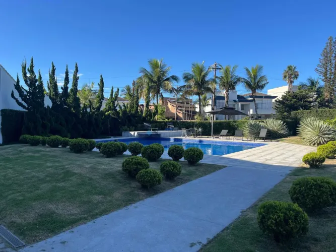Casa a venda no Condomínio Jardim Acapulco no Guarujá | QVista Inteligência Imobiliária
