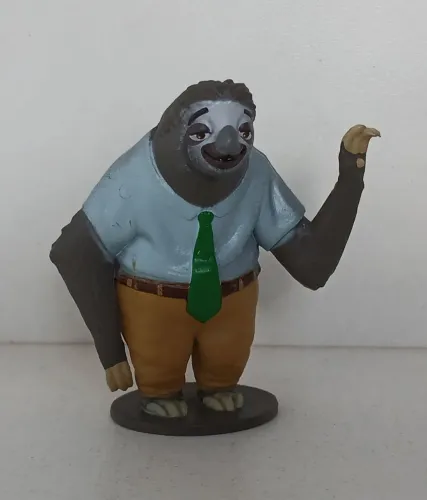 BONECO MINIATURA DISNEY ZOOTOPIA FLASH PREGUIÇA ORIGINAL