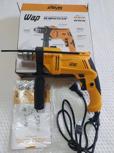 Furadeira e parafusadeira de impacto 127v 700w 10mm marca WAP nova sem uso 