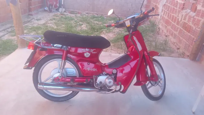 Vendo moto Traxx conservada no ponto de transferir único dono tinta original
