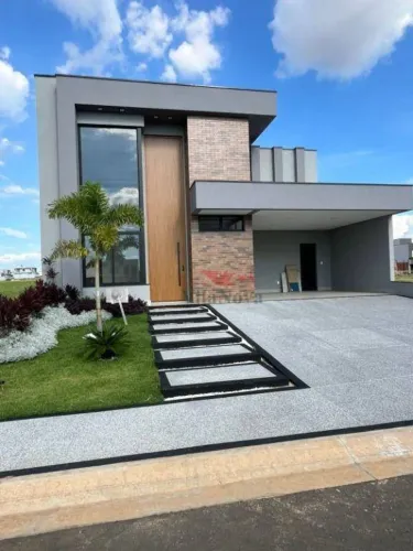 CASA DE ALTO PADRÃO À VENDA COM 3 SUÍTES, ESCRITÓRIO, ÁREA GOURMET, PISCINA E 4 VAGAS NO C