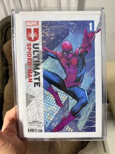 Spider-Man ULTIMATE 1st print USA NM + com Toploader 