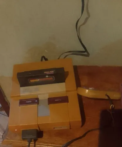 Snes funciona perfeitamente 