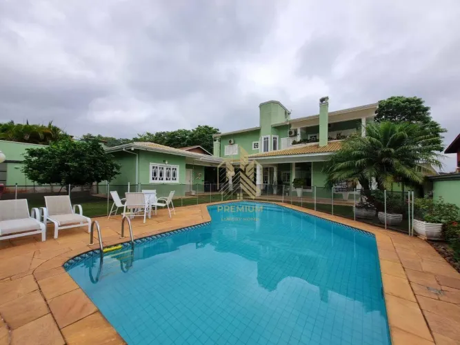 Casa com 4 dormitórios à venda, 465 m² por R$ 2.580.000,00 - Condomínio Shambala III - Ati