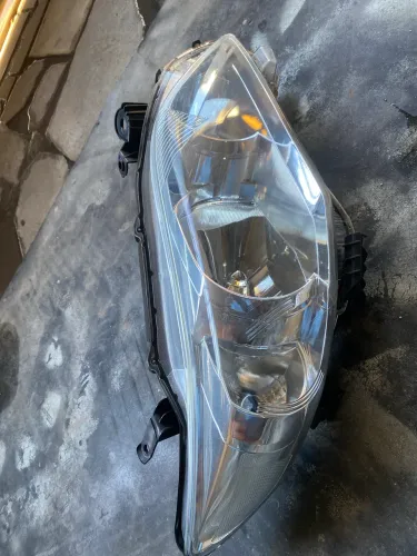 Farol Lado direito Toyota corola 2012