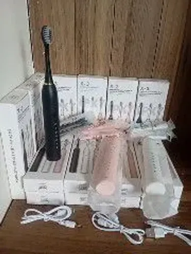 Escova de dente elétrica