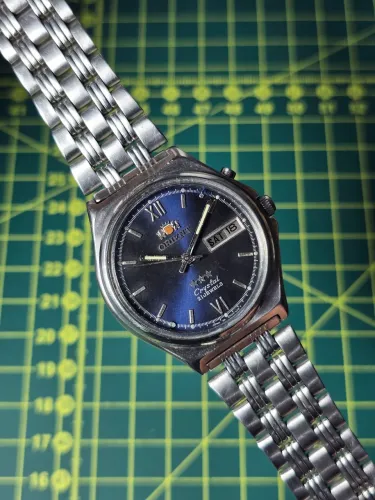 Relógio Orient Crystal Automático 21 Jewels Vintage - Mostrador Azul com Numerais Romanos