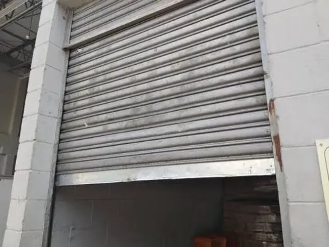 Manutenção em sua porta de rolo 