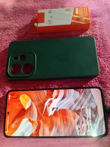 Redmi note 14 de 128 gigas e 8 de Ram, com câmeras trás de 108 e frontal de 20 megapíxel..
