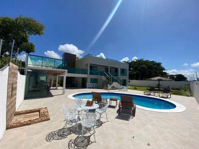Casa de altíssimo padrão a Beira Mar com 4 quartos, móveis planejados, piscina, terreno 1.