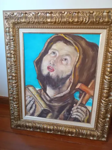 Quadro religioso em moldura de madeira