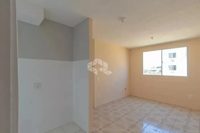 Apartamento 2 dormitórios, banheiro social , sala, cozinha e área de serviço, vaga rotativ