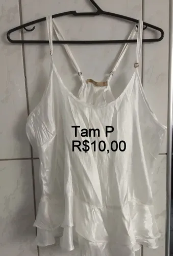 Roupas femininas branca Tam e valor nas fotos