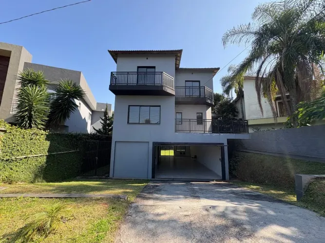 Casa de condomínio para venda com 417 metros quadrados com 5 quartos