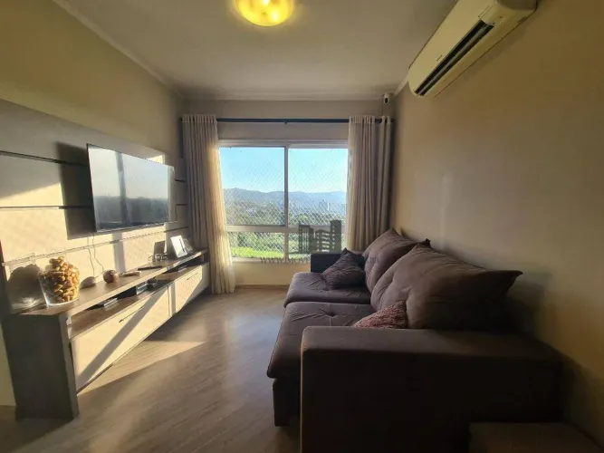 Apartamento de 2 dormitórios semi mobiliado com 1 suíte, churrasqueira 01 box/vaga no bair