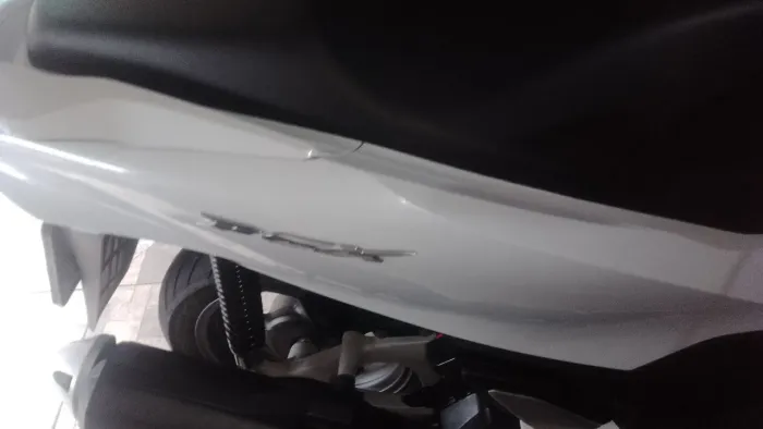 Moto nova na garagem