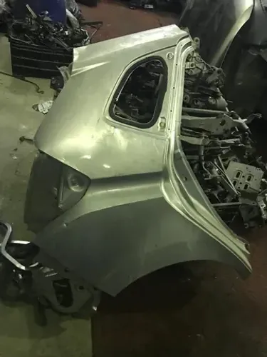Folha de lateral Honda Fit caixa de roda 