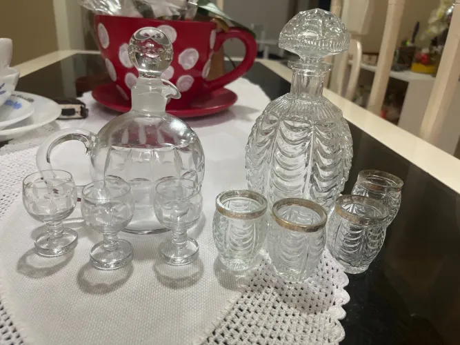 Lote de garrafa com seu copinhos