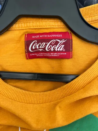 Camiseta Coca-Cola laranja Fanta Oficial