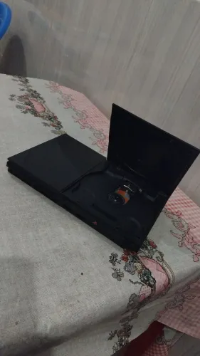 PS2 (usado) - Dois controles - Um MemoryCard - TODOS os cabos - Duas pastas de jogos