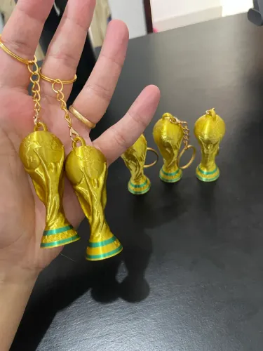 Chaveiro réplica Copa do Mundo 2026 mini troféu chaveiro dourado