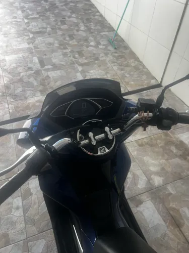 PCX com revisões periódicas em dias com 2 pneus novos!