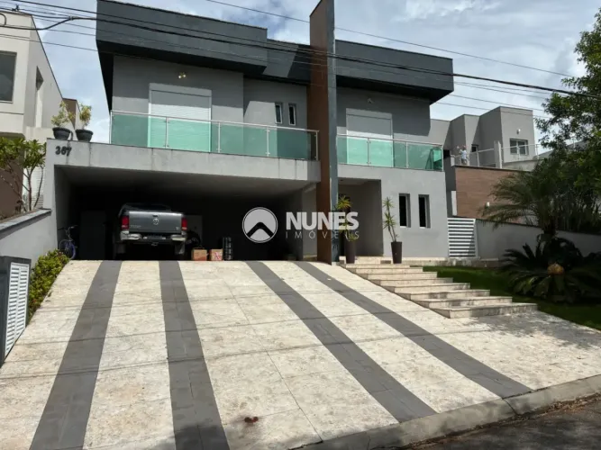 Casa em condomínio fechado com 4 suítes e Vagas de garagem - Jandira - pronto para morar