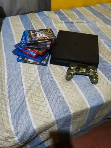 Ps4 slim 1tb em perfeito estado + 7 jogos + 1 um controle