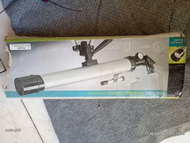 estou vendendo um telescópio refrator com tripé