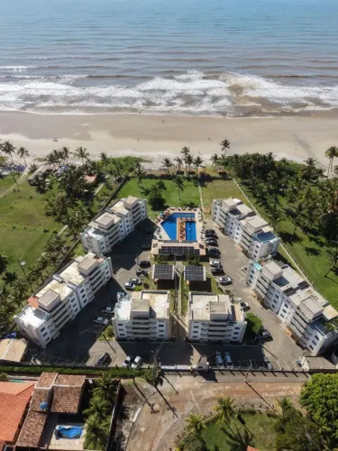 Apartamento em condomínio pé na areia Ilhéus