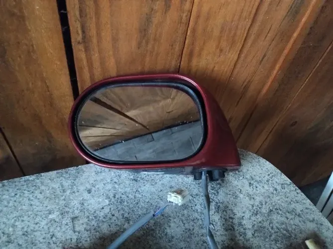 Retrovisor elétrico Livina esquerdo