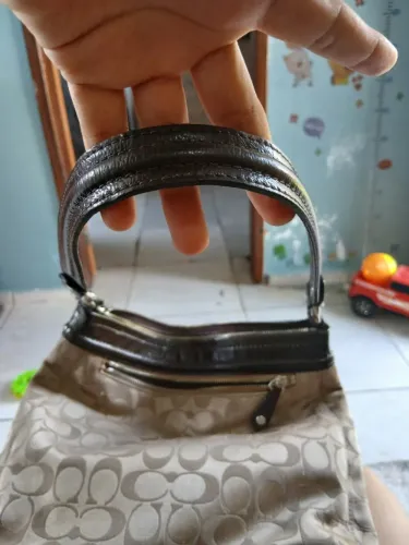 Bolsa coach original com selo de autenticidade