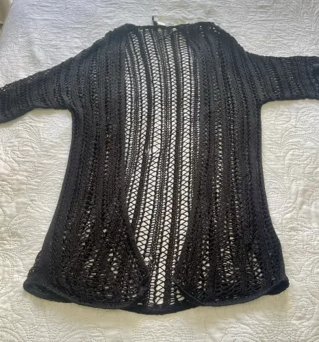 Pode ser usada como saída de praia ou usar com camisetas por baixo
