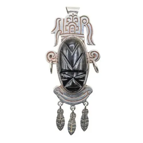 broche de máscara tribal mexicano vintage de prata esterlina com pedra de ônix negro.
