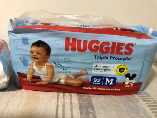 Fraldas Huggies tripla proteção fita