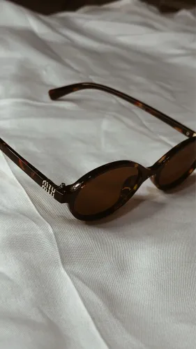 óculos de sol miumiu
