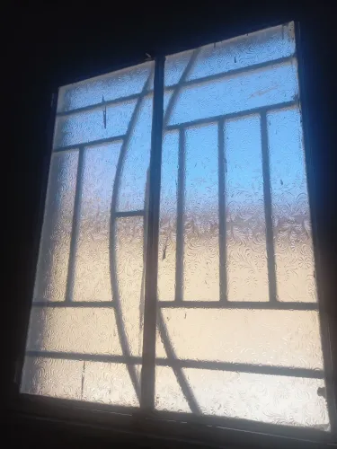 Janela vidro, gradeado