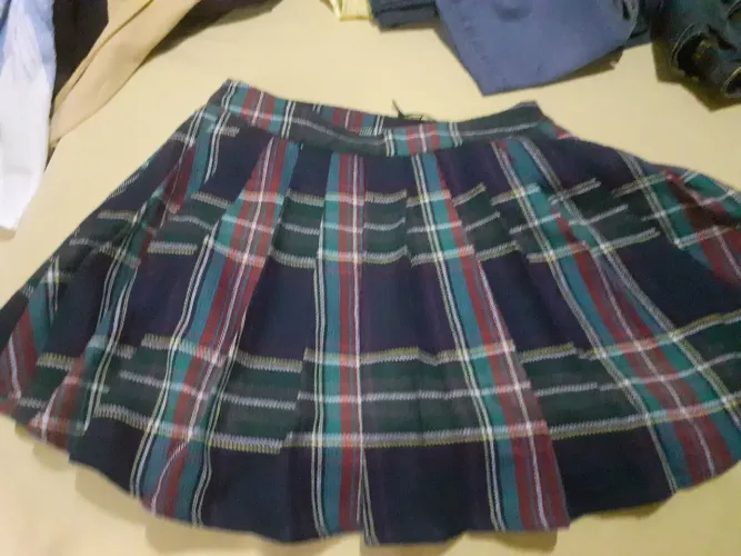 Saia xadrez plissada.. SEMI.NOVA