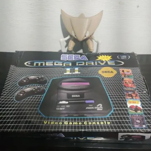 Mega drive Chinês - na caixa - 5 games na memória - 2 controles de 6 botões- AV integrado