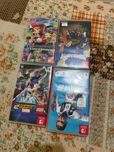 Lote jogos Nintendo Switch (Mario Kart, FIFA 19, Lego Marvel e Digimon Survive)