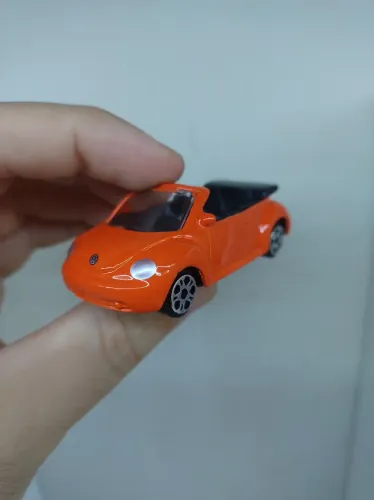 Miniatura Maisto Volkswagen Fusca New Beetle Cabro Laranja Conversível 1:64 Loose Novo