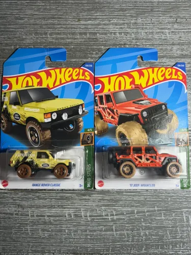 2 Hot Wheels - 01 T hunt Jeep Wrangler , 01 Range Rover Classic