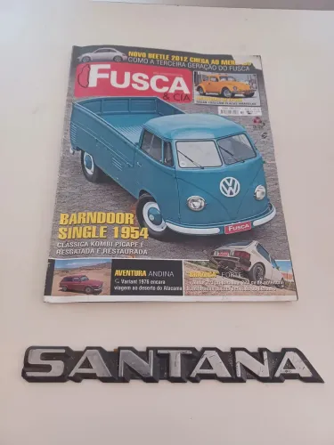 REVISTA E EMBLEMA ORIGINAL VEICULOS VOLKSWAGEN POR 20 REAIS DESAPEGO TOTAL.