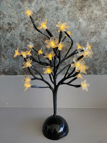 Árvore de luz decorativa com flores